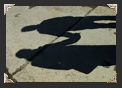 Shadow of couple holding hands