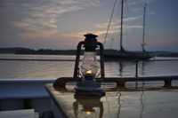 Lantern on cabin top at sunset