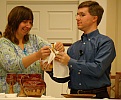Pastors Lisa and Eric Pridmore serving communion