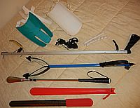 sample dressing devices including sock aids, reachers, and shoe horns