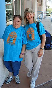 Two women in Disability Connection T-shirts
