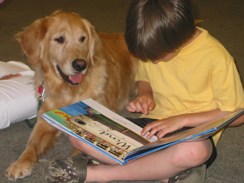Dog and Child Reading