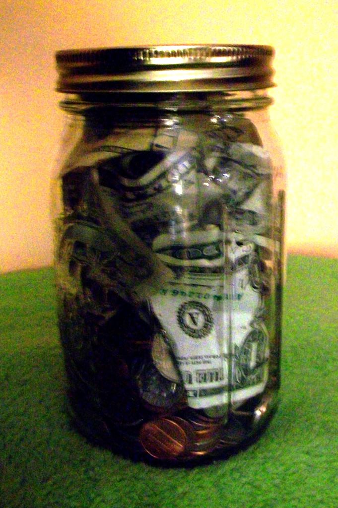 canning jar with money 