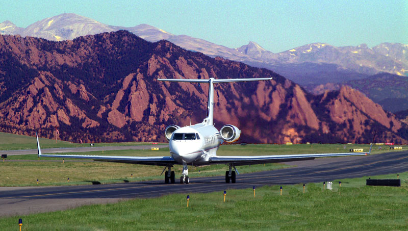 Plane landing at Rocky Mountain Metropolitan Airport