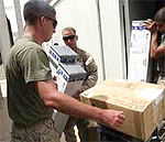 Marine getting care packages in Iraq