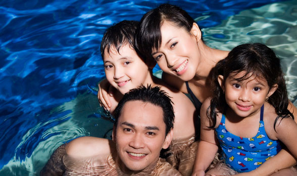 Family in pool