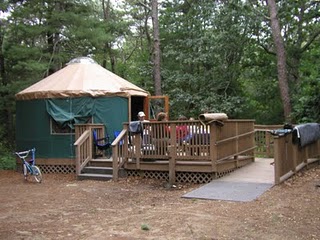Yurt with deck and wheelchair access ramp. 
