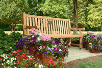 memorial bench with flowers