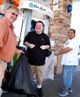 ProAct staff and consumers collect recylcling cans and bottles at area convenience stores