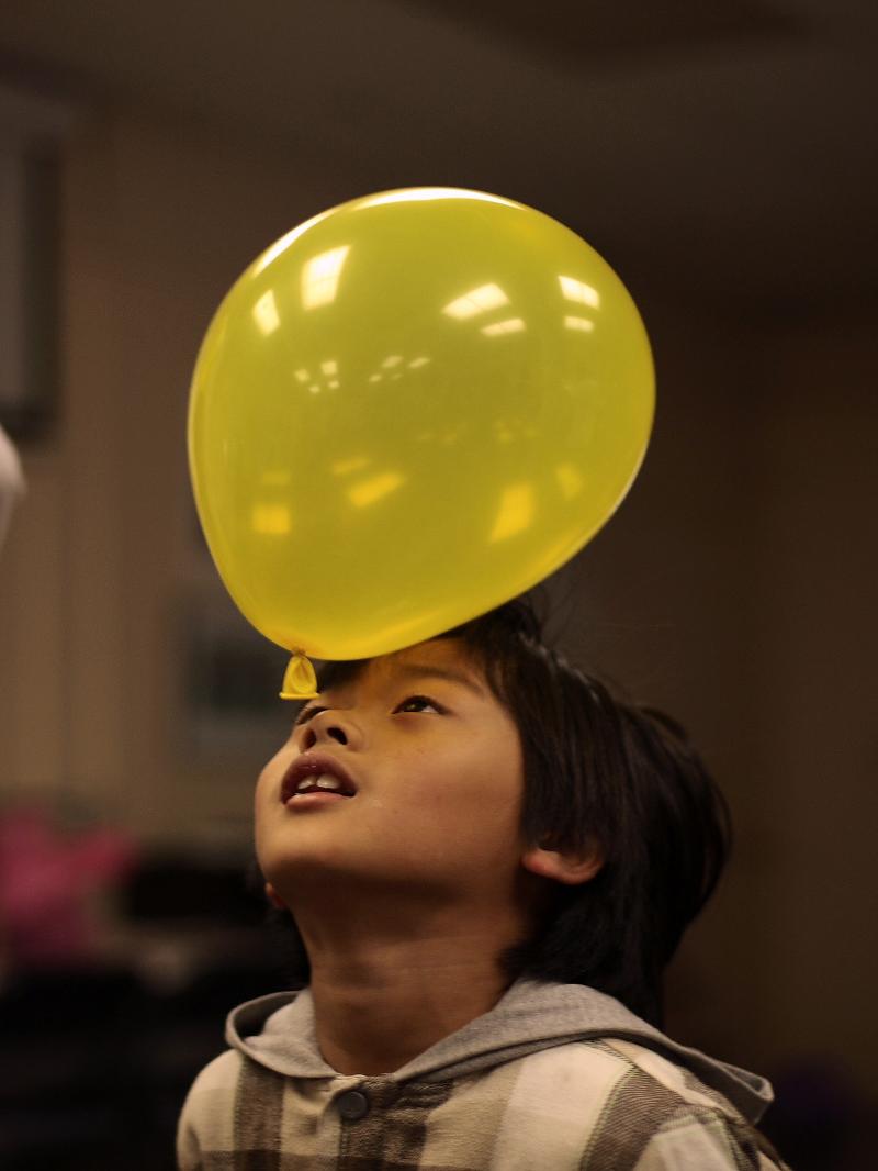 child with balloon