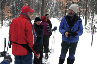 Snowshoeing in Maine woods