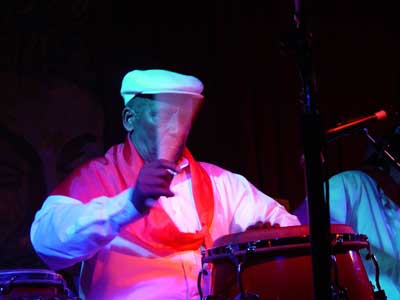 Aguabella Playing Drums