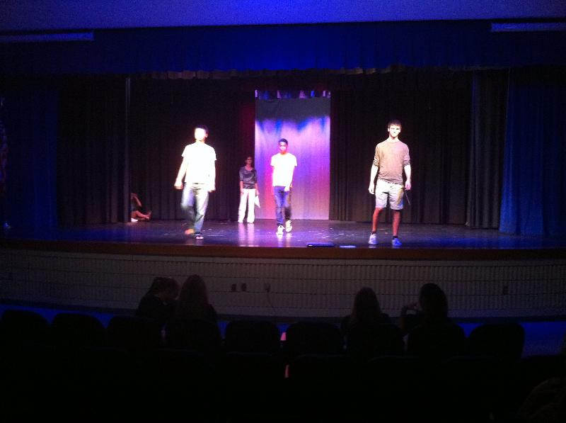 Teen Fashion Show Rehearsal, 3 boys on stage at Barron Collier