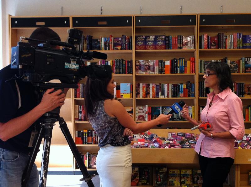Wink-TV Reporter Interviews Vivian Hadding, Mgr., Book Warehouse,