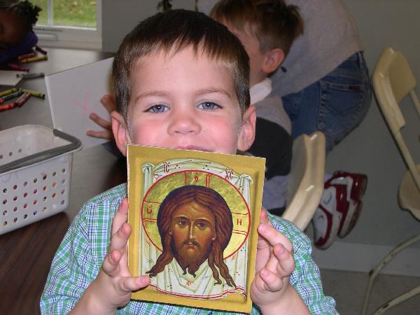 Child with icon