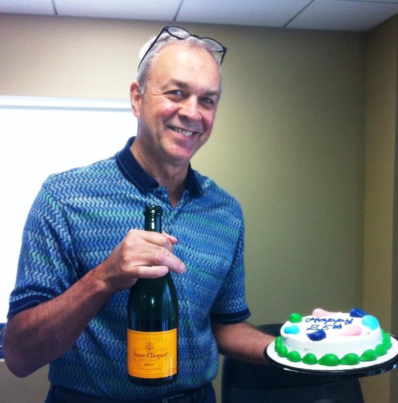 ED Phil Giffee with Cake from Staff