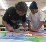 Mentor and student collaborate on Peace Mural