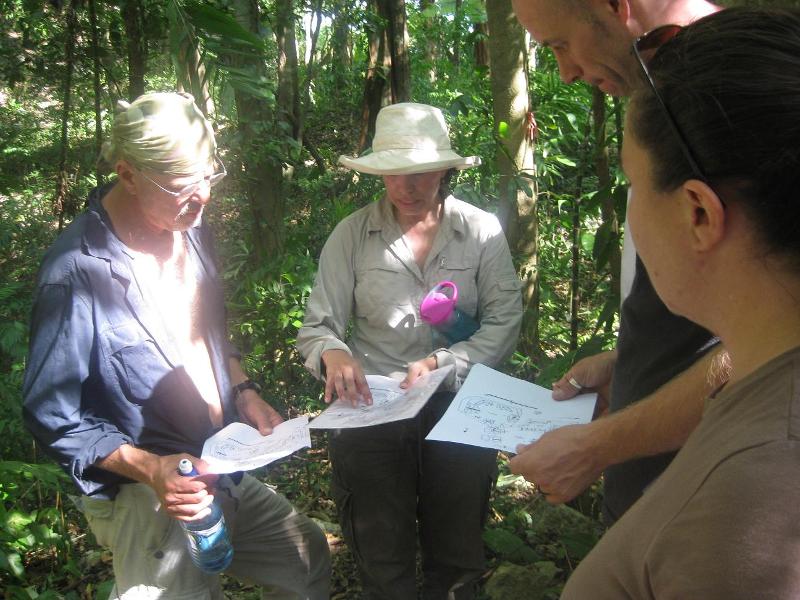 Dr Lisa Lucero explaining map of Yalbac Maya site near Cara Blanca Pools