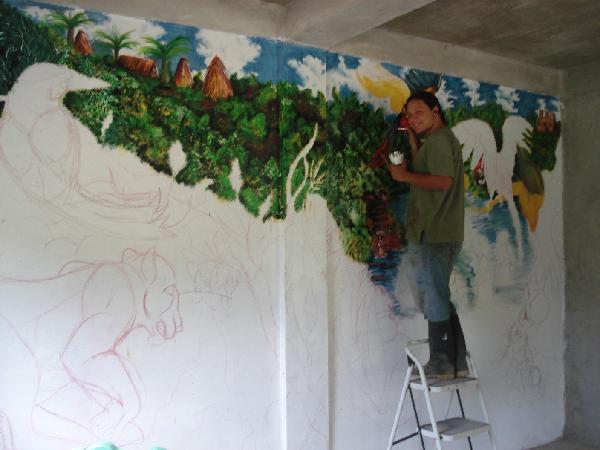 Giovanni Paolo Cenna Carr painting a mural