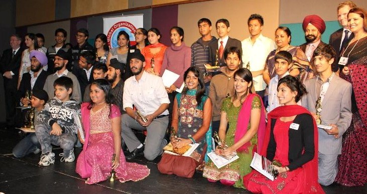 Officials of GOPIO Metro Sydney chapters with young achievers