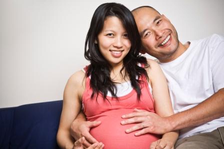 Pregnant Asian couple