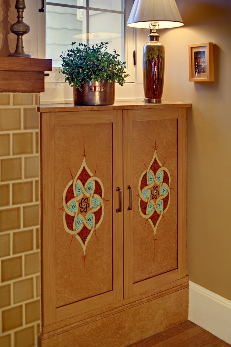 Custom cabinet glazed and stenciled with an Islamic 7 circle design.