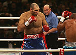 image boxing ring big man beating smaller man