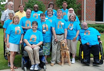 Group photo of committee in their blue T-shirts