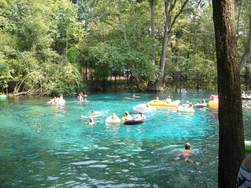 People Enjoy the cool waters of Ginnie Springs in High Springs Florida