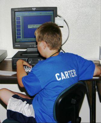 Boy completing an application
