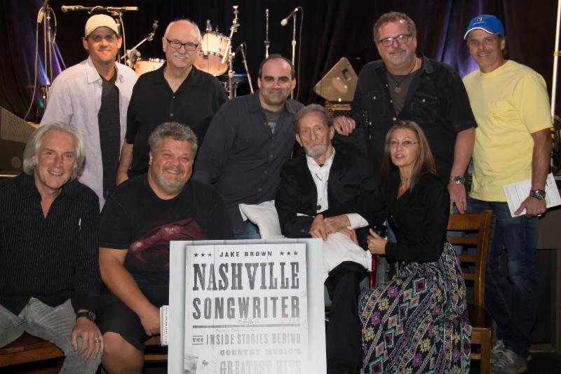 L to R seated are Jeff Silbar, Craig Wiseman, author Jake Brown with arm around Freddy Powers and Catherine Powers.  Standing L to R are Neil Thrasher, Sonny Curtis, Bob DiPiero and Kelley Lovelace   PHOTOGRAPHER credit  Kindell Moore