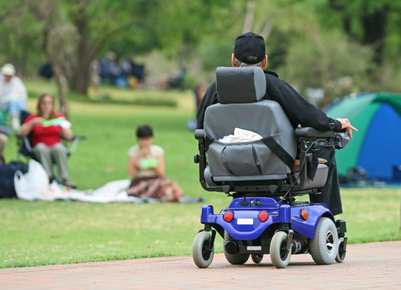Man in power wheelchair